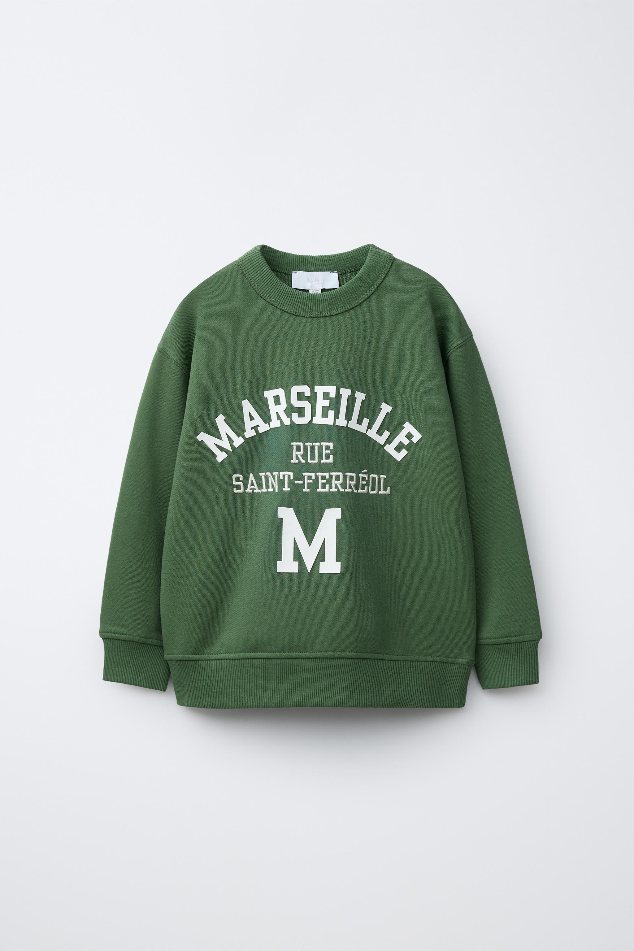 RAISED TEXT SWEATSHIRT